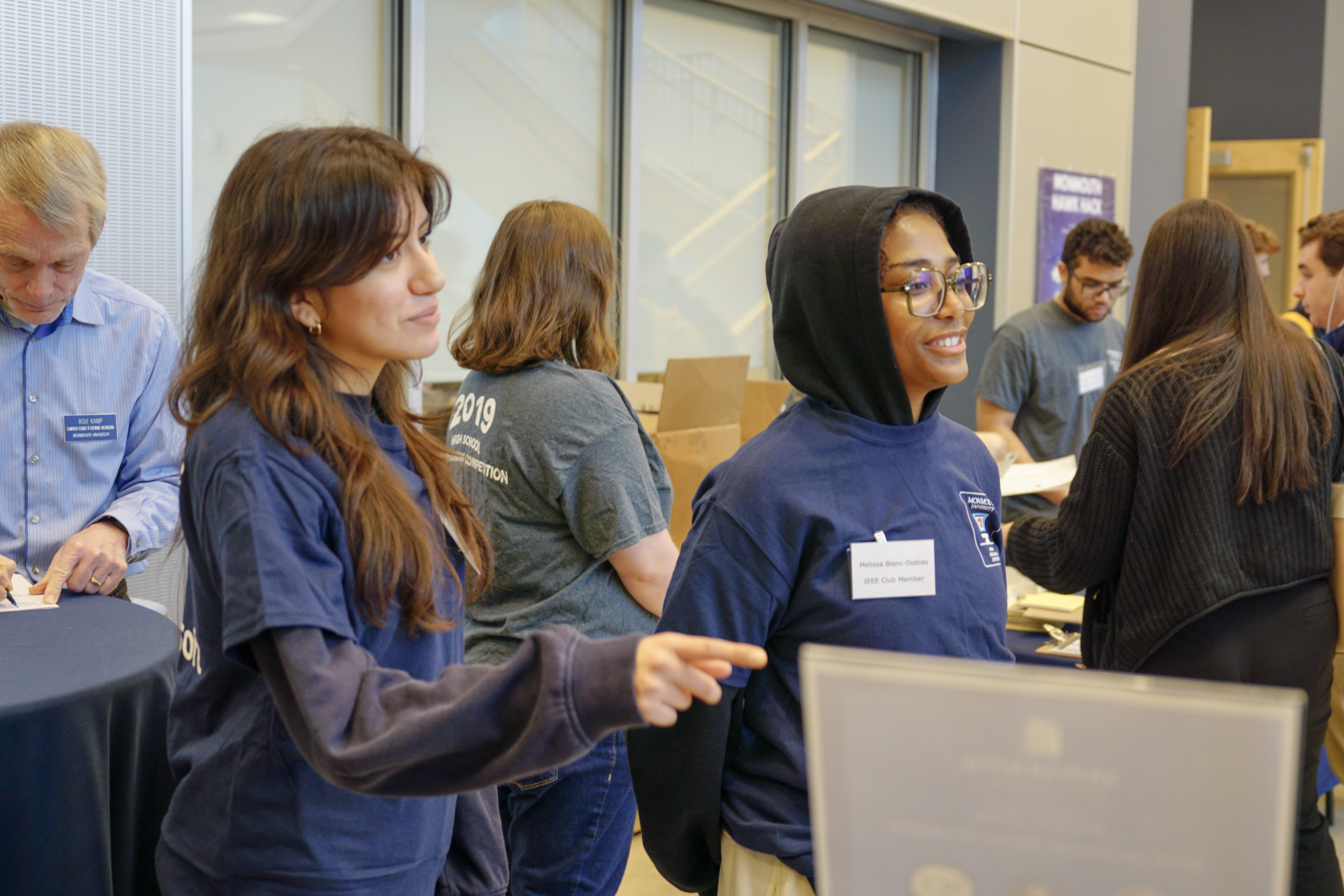 Students networking at IEEE/ACM event